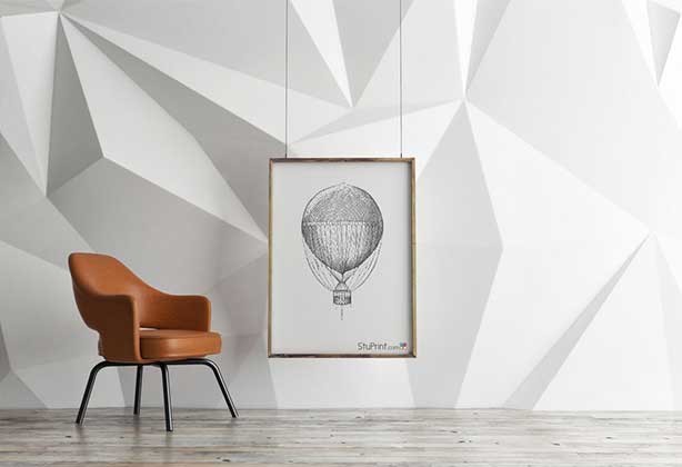 Poster hanging in gallery with a hot air balloon design