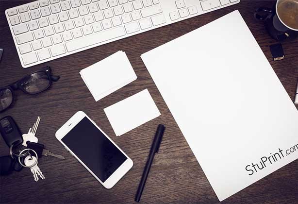 Letterheads and business cards on a desk