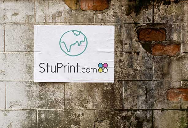 White 80gsm paper sticker on brick wall with drawing of a globe on it